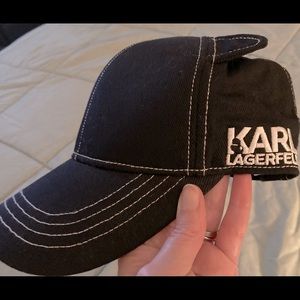 Karl Lagerfeld hat with cat ears.